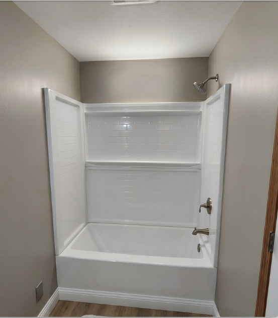 Finished Bathroom Drywall Repair – Hillsboro OR Finished bathroom wall after drywall repair in Hillsboro OR